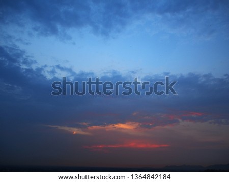 Dark blue stormy cloudy sky natural photo background with Instagram toned effect