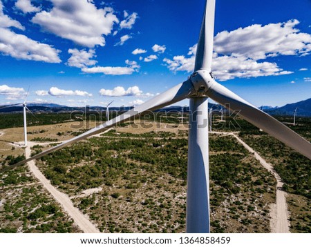 Wind turbines or windmills in desert landscape in Croatia, Renewable Energy