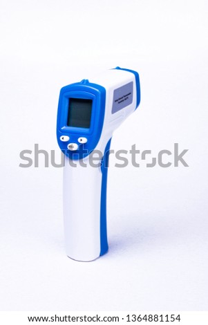 infrared thermometer on white background Royalty-Free Stock Photo #1364881154