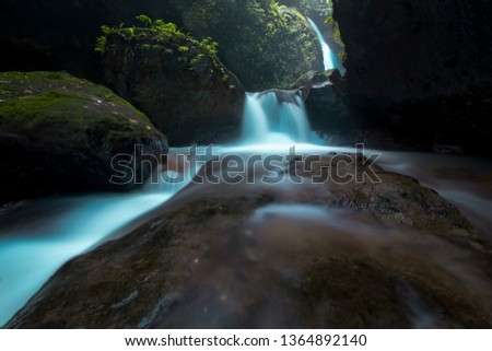 Waterfall hidden in the tropical forest