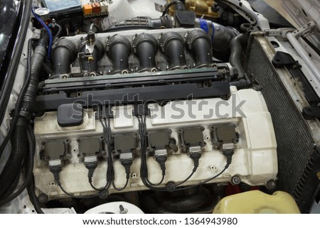 Closeup of the old powerful car engine. Internal design of engine. 