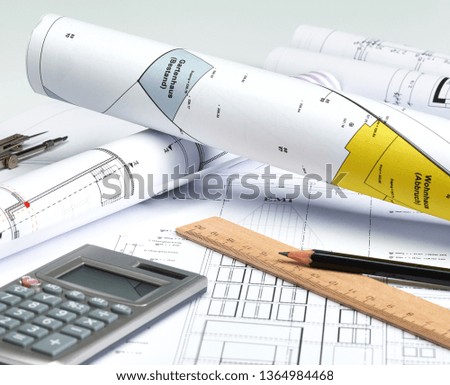 architectural plans on a desk 