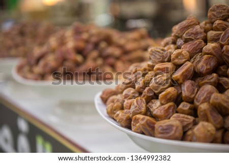 Date fruits in the shop. Arabian date displayed in a shop during Ramadan festive season. Royalty-Free Stock Photo #1364992382