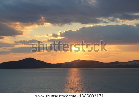 Breathtaken sundown in small town Gulluk, Turkey. Mediterranean sea.