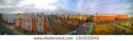 Wild panoramic view of the street with modern buildings and streets with cars, spring, Spain