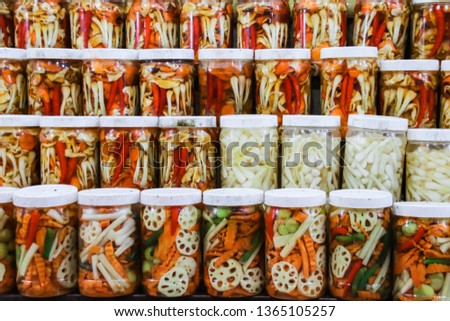Different kinds of vietnamese pickles ( Do chua) displayed at Hanoi, Vietnam local market