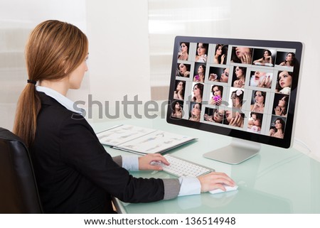 Designer Woman Working On Computer In The Office