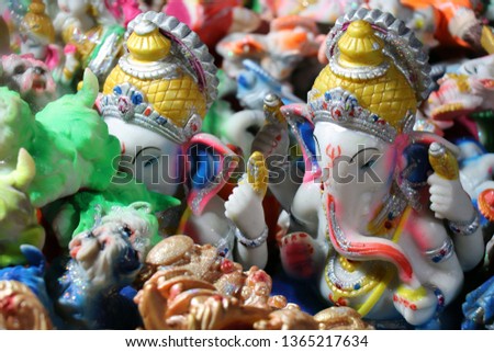 Statues of Lord Ganesh on the street market in Puri. On the Puri beach, Odisha, these awesome statues were kept to sell. Close up and details of traditional artisan objects, Asian culture concept.