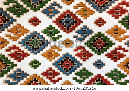 Geometric tile pattern. Closeup detail of old glazed tiles. Traditional ornate portuguese decorative tiles azulejos. Ceramic tile