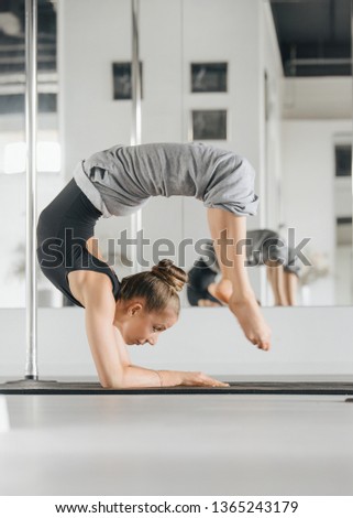     Professional flexible gymnast showing her flexibility skills