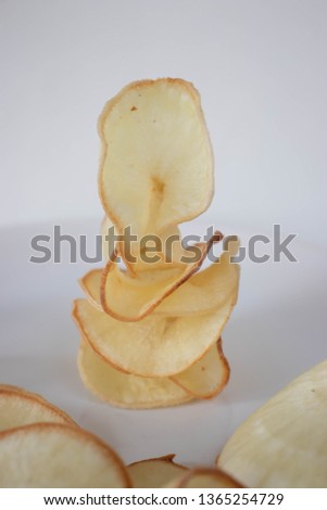 Cassava chips on a white background