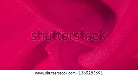 texture background pattern red silk fabric. This silk organza has a gentle open weave. Use this luxurious fabric for anything from your design for special occasions to creating your projects.