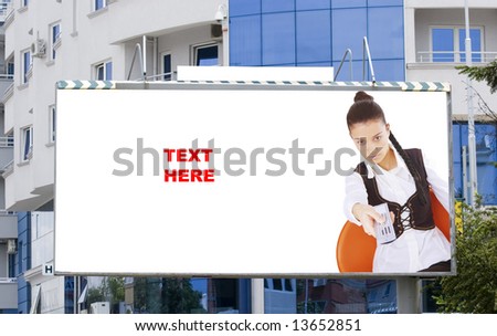 blank billboard in city and young woman