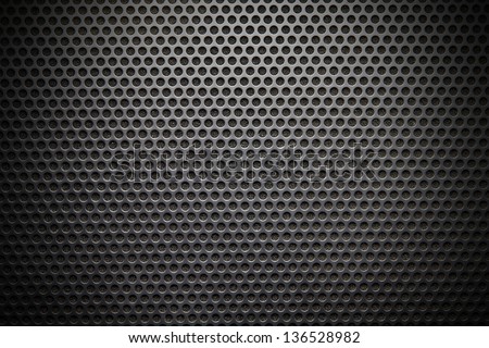 Black speaker lattice background, close-up Royalty-Free Stock Photo #136528982