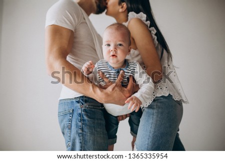 Happy family with their first child