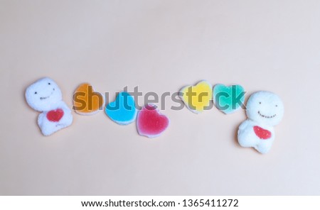 colorful jelly Marshmellows candy  in heart shape .concept of love.Happiness.Holiday. background with snow man sending love concept idea . love from distance concept idea background. quarantine love