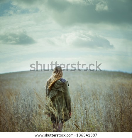 romantic vintage picture of beautiful girl in field