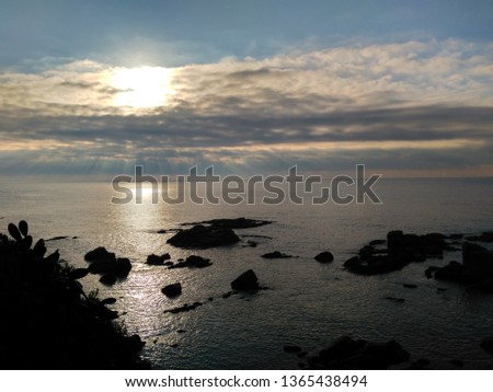 Sunset beach rocky coast of Llafranc (Palafrugell, Costa Brava - Spain). 