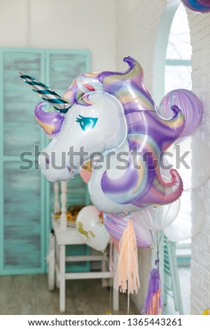 
scenery in the style of a unicorn. Balloon unicorn, big bright balloon.
