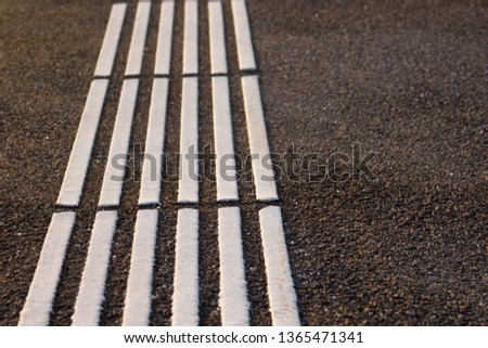 white lines limiter on the platform for text
