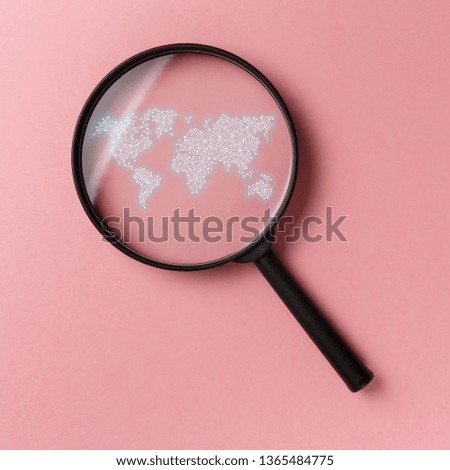 Concept information search. Magnifying glass with international map on pink background. World community and Neural network. New minimal creative concept. Searching information data on internet
