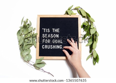 This styled stock photo features a classic letter board with a fun motivational quote perfect for your creative business or blog! Greenery and a little touch of human bring this image together.