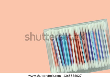 Isolated cotton bud in box. Colorfull Cotton swab used for cleaning ear.
