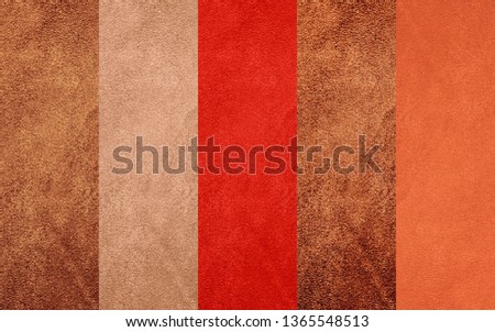 suede. Vertical brown and red stripes of suede texture material are collected in a collage.