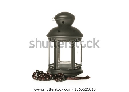 Ramadan or arabic lantern with prayer beads isolated on white background
