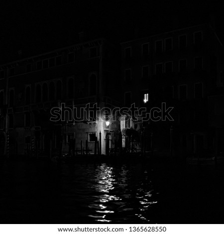 Dark and Moody Venice Italy Door at night across for canal