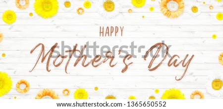 happy mother's day text sign on wooden background. greeting card concept