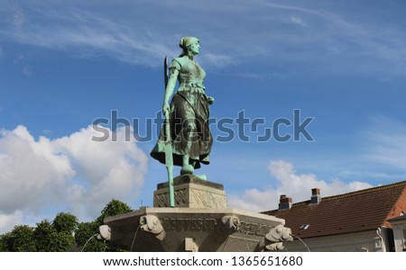 city of husum germany landmark statue named tine Royalty-Free Stock Photo #1365651680