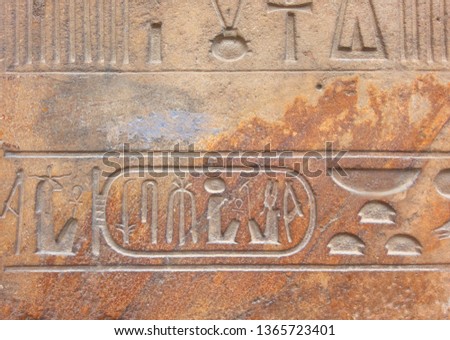 Hieroglyphics on rock surface during Rameses dynasty.
