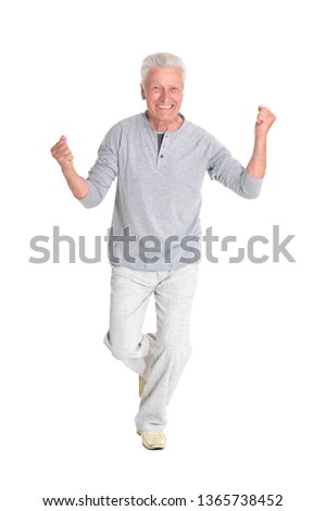 Successful senior man in casual clothing posing isolated
