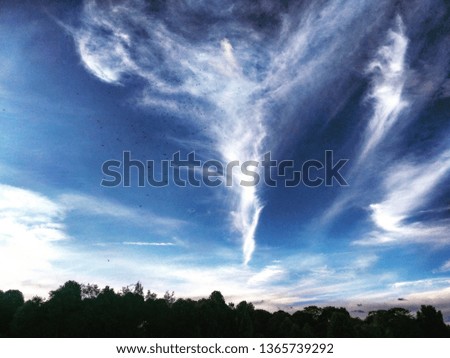 sky with angel-shaped clouds