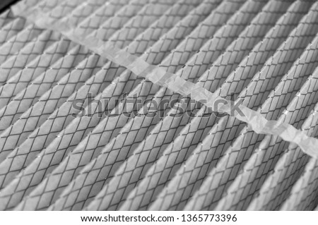 Clean White House air filter close-up  with wire supports Royalty-Free Stock Photo #1365773396