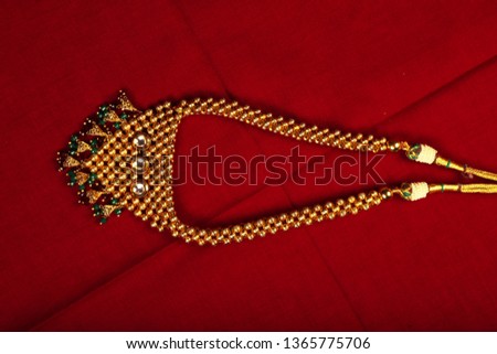 Authentic Traditional Indian Jewelery Necklace On Dark Background. Wear in Neck in Wedding, Festivals And Other Occasion. Very Useful Image For Website, Printing & Mobile Application