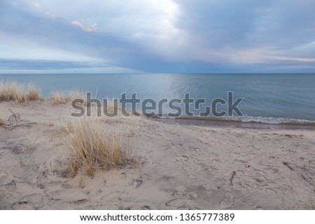 Motion blurred photo of a Great Lakes beach on a windy evening