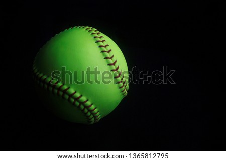 A green softball 