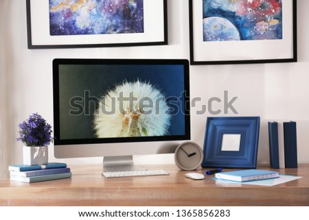 Modern workplace interior with computer on table