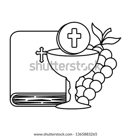holy bible with chalice and grapes