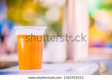 Plastic cup of beer, Disposable glass