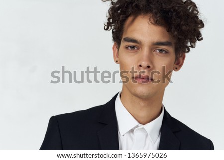 Cute business man in a suit office worker gray background