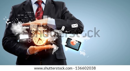 Image of businessman holding alarmclock against illustration background. Collage Royalty-Free Stock Photo #136602038