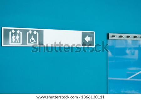 Blue Toilet sign at the swimming pool