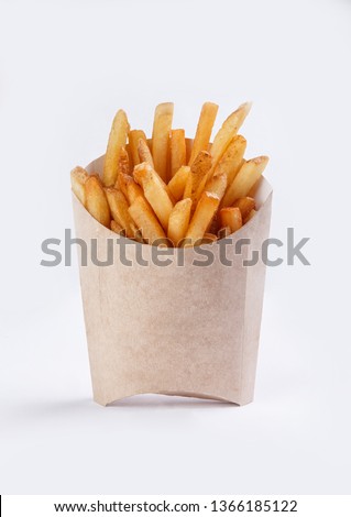 french fries in box on white background Royalty-Free Stock Photo #1366185122