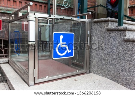 modern wheelchair lift near the building