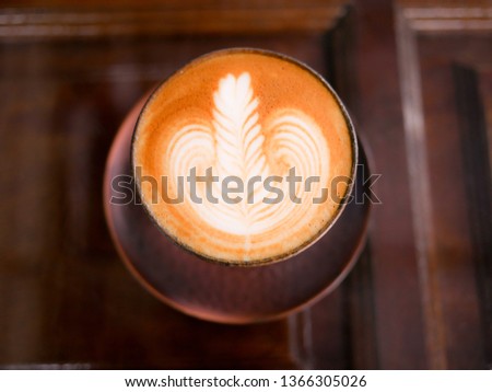 Coffee cup  on wooden  table. Top view background 