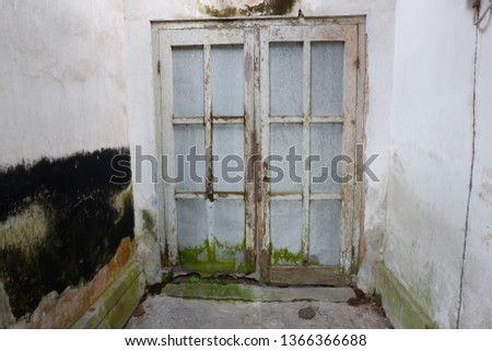 doors that have weathered the wood