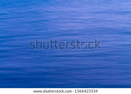Sea surface aerial view with blue ocean waves